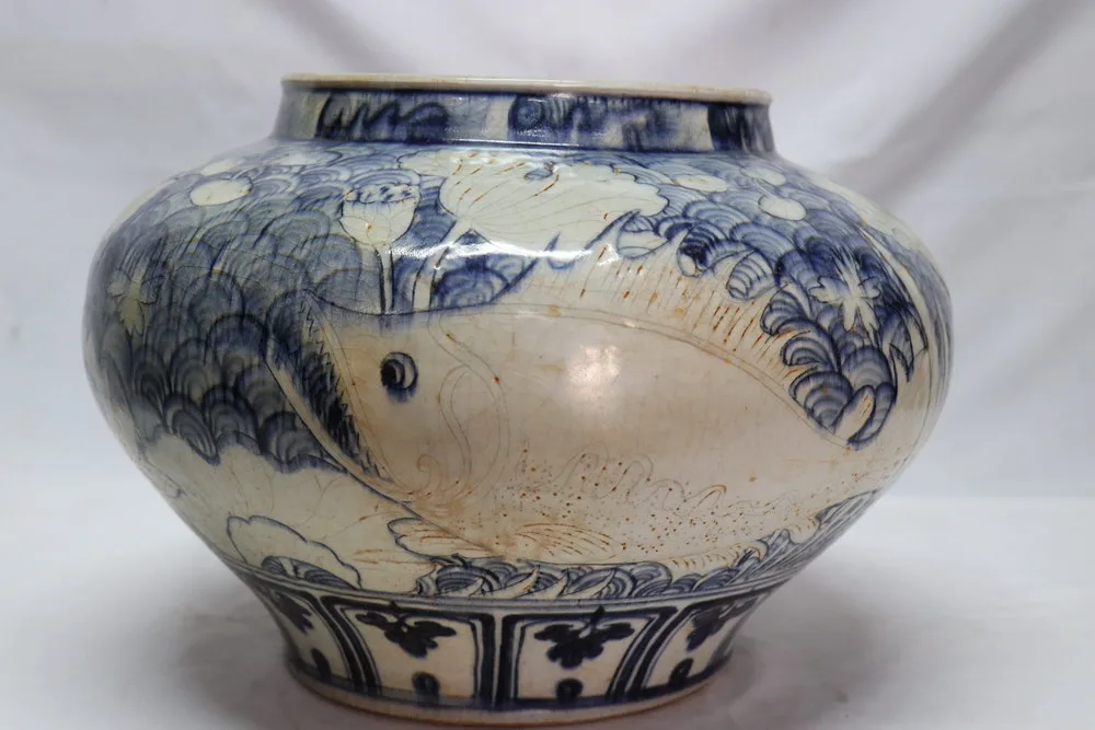 Early Yuan Dynasty Blue and White Porcelain Jar with Fish and Lotus Carving